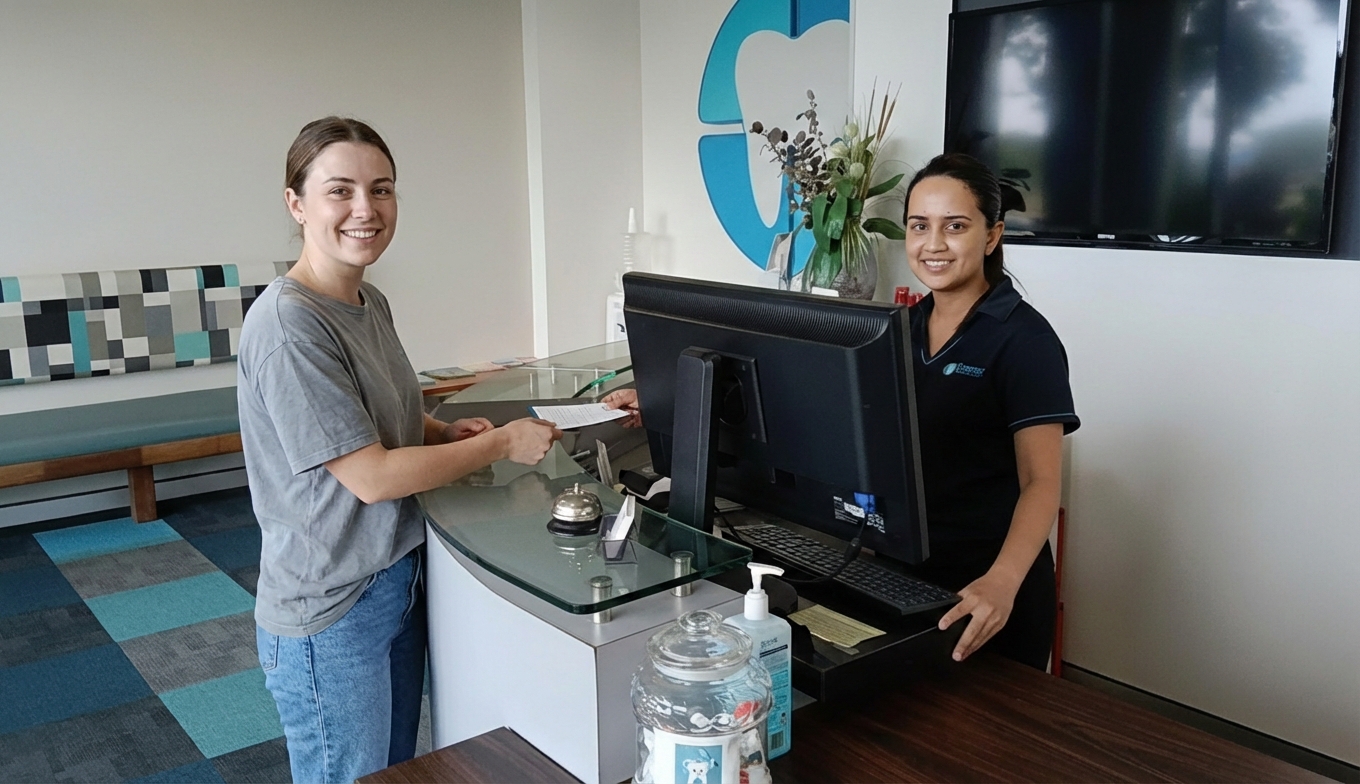 Reception team welcoming a patient at Compass Dental Care in Parap, Darwin